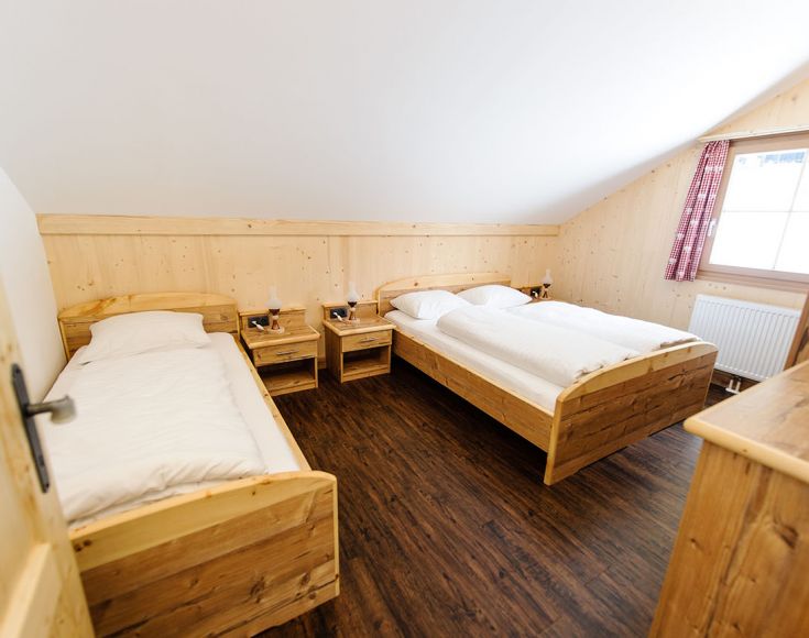 Dreibettzimmer im Ferienhaus Steiermark